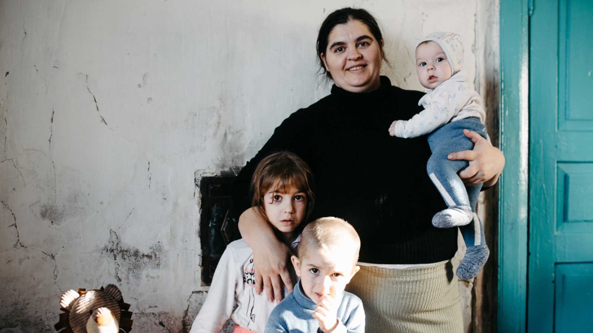 A woman with three children.